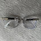 Rimless Bottom Chrome Heart Glasses – Clear & Silver Edition.